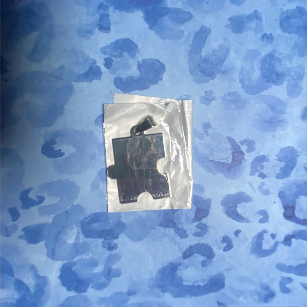 Silver Puzzle Piece Pendant